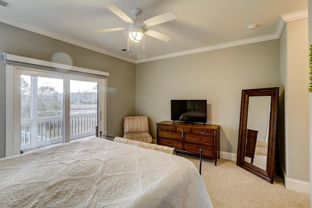 bedroom with light carpet, crown molding, baseboards, and access to exterior