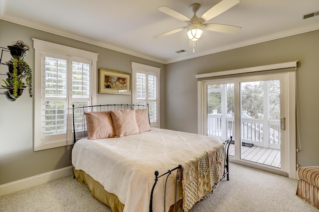 bedroom with visible vents, crown molding, baseboards, and access to outside