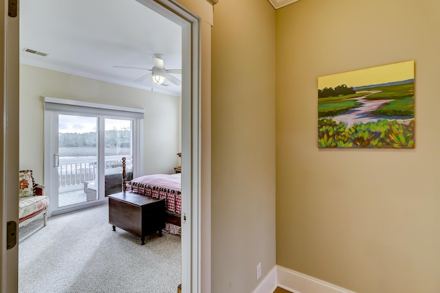 interior space featuring visible vents, baseboards, and carpet