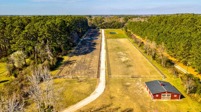 aerial view with a view of trees and a rural view