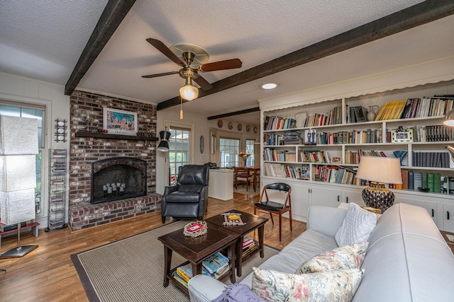 206 Brailsford Rd, Summerville, SC 29485 - living area featuring a ceiling fan, wood finished floors, beam ceiling, and a textured ceiling