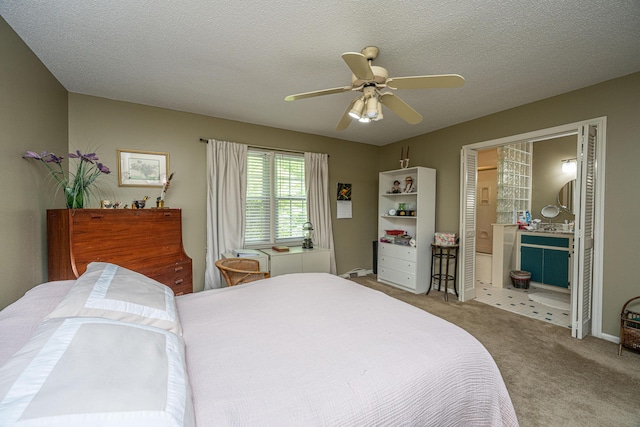 206 Brailsford Rd, Summerville, SC 29485 - carpeted bedroom featuring a textured ceiling, ceiling fan, and connected bathroom