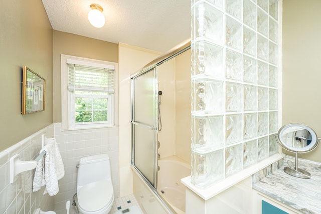 206 Brailsford Rd, Summerville, SC 29485 - bathroom with a textured ceiling, shower / bath combination with glass door, and toilet