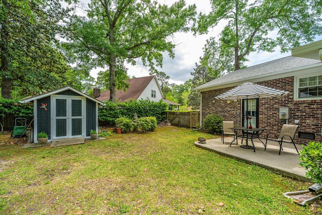 206 Brailsford Rd, Summerville, SC 29485 - view of yard featuring fence, a patio area, an outdoor structure, and a storage shed