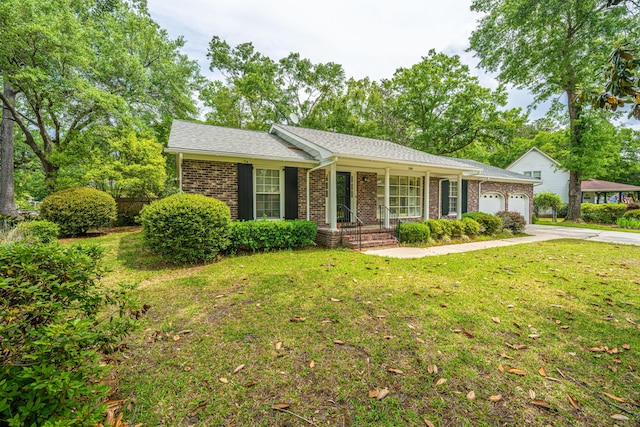 206 Brailsford Rd, Summerville, SC 29485 - ranch-style home featuring a front lawn, a porch, concrete driveway, a garage, and brick siding