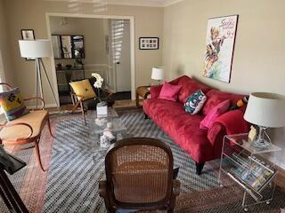 206 Brailsford Rd, Summerville, SC 29485 - carpeted living area featuring ornamental molding
