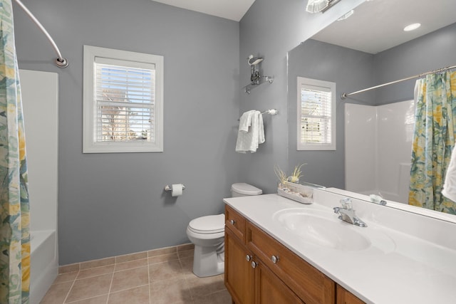 bathroom featuring shower / tub combo, toilet, vanity, and tile patterned flooring