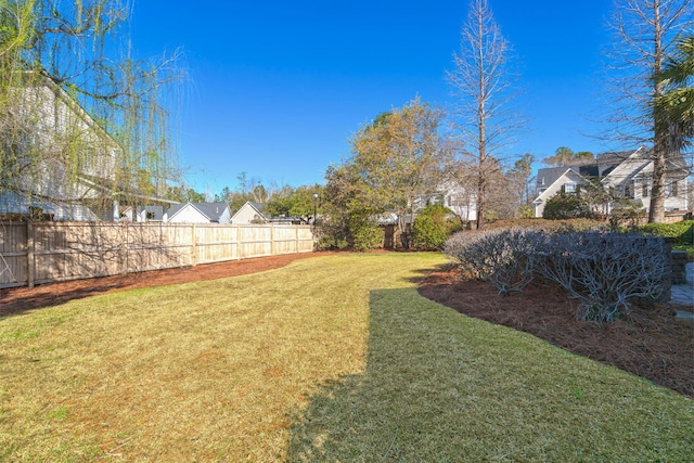 view of yard featuring fence