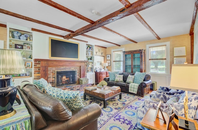 481 Cantey Ln, Camden, SC 29020 - living room with beam ceiling, a fireplace, and built in features