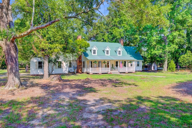 481 Cantey Ln, Camden, SC 29020 - view of front of property with a chimney, covered porch, and a front yard