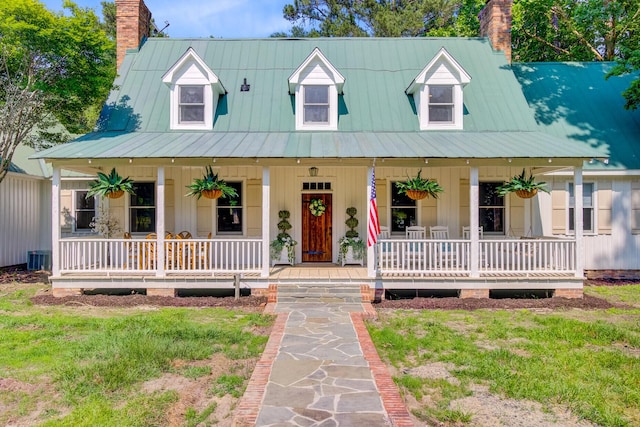481 Cantey Ln, Camden, SC 29020 - view of front of home featuring a porch, a chimney, and metal roof
