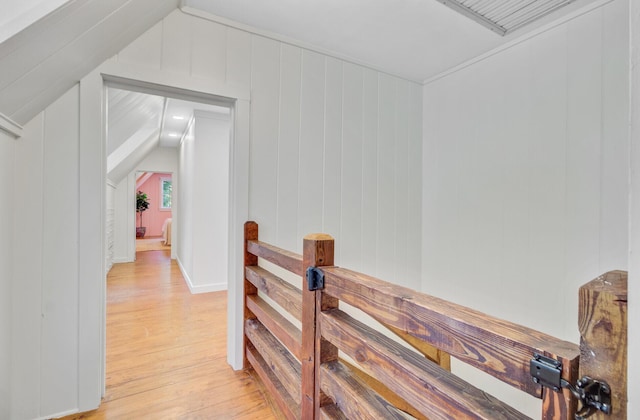 481 Cantey Ln, Camden, SC 29020 - hallway with light wood finished floors, lofted ceiling, and an upstairs landing