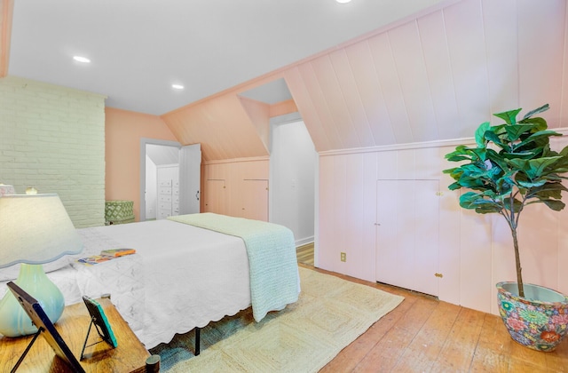 481 Cantey Ln, Camden, SC 29020 - bedroom featuring hardwood / wood-style flooring, vaulted ceiling, and recessed lighting