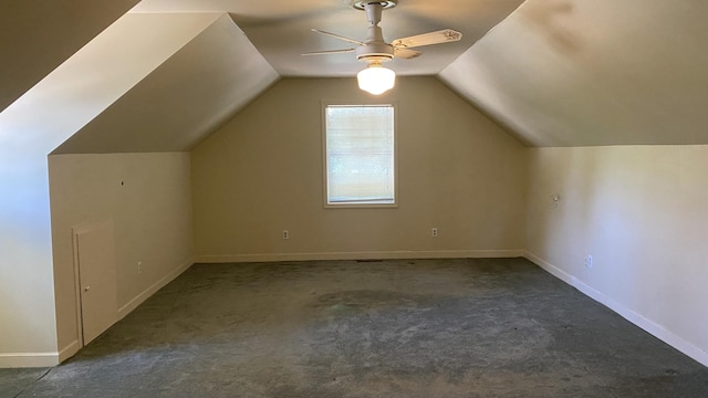 additional living space with carpet, lofted ceiling, and ceiling fan