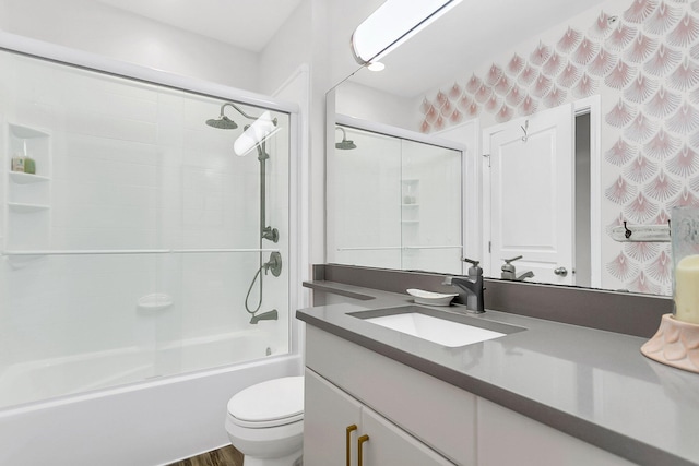 full bathroom with vanity, toilet, enclosed tub / shower combo, and wood-type flooring