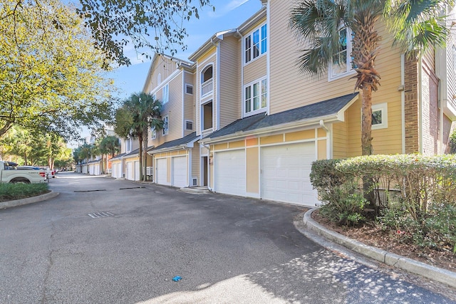 view of property featuring a garage