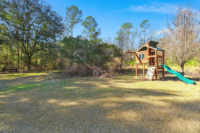 view of playground featuring a yard