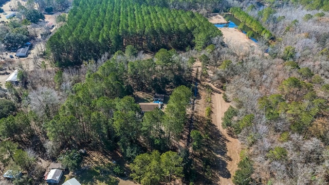 bird's eye view featuring a view of trees