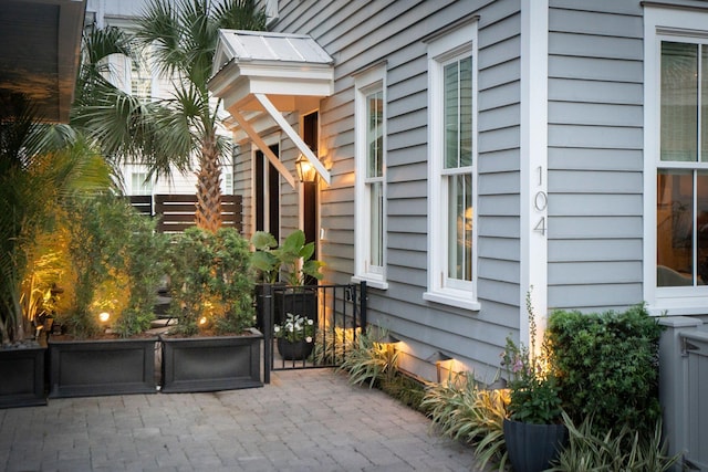 104 May Ln, Mount Pleasant, SC 29464 - view of side of home featuring a patio area
