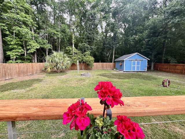 1325 Edward Dr, Moncks Corner, SC 29461 - view of yard featuring a storage shed, a deck, and an outdoor structure