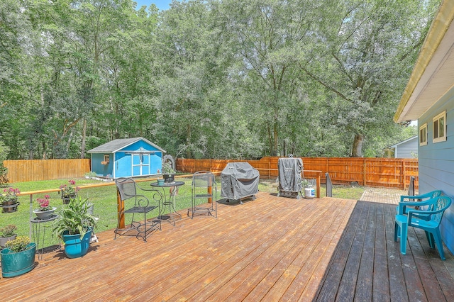 1325 Edward Dr, Moncks Corner, SC 29461 - deck featuring area for grilling, a storage shed, and an outdoor structure