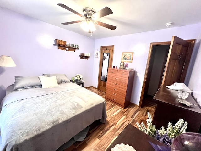 1325 Edward Dr, Moncks Corner, SC 29461 - bedroom with light wood-type flooring, a ceiling fan, and baseboards