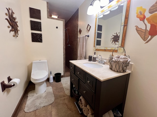 1325 Edward Dr, Moncks Corner, SC 29461 - bathroom with vanity, a tile shower, toilet, baseboards, and tile patterned flooring