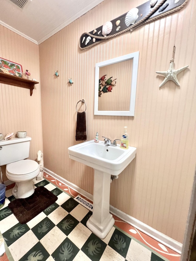 1325 Edward Dr, Moncks Corner, SC 29461 - half bath with tile patterned floors, toilet, ornamental molding, and baseboards