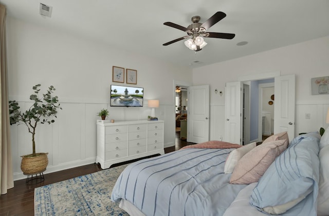 bedroom featuring ceiling fan and dark hardwood / wood-style flooring