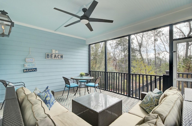 sunroom / solarium with ceiling fan