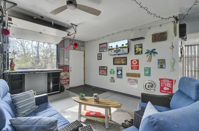 living room featuring ceiling fan