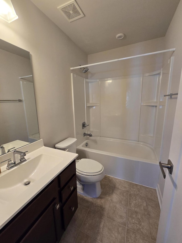 bathroom with visible vents, toilet, tub / shower combination, vanity, and tile patterned floors