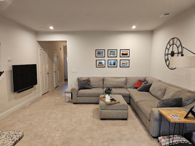 living area featuring baseboards, carpet flooring, visible vents, and recessed lighting