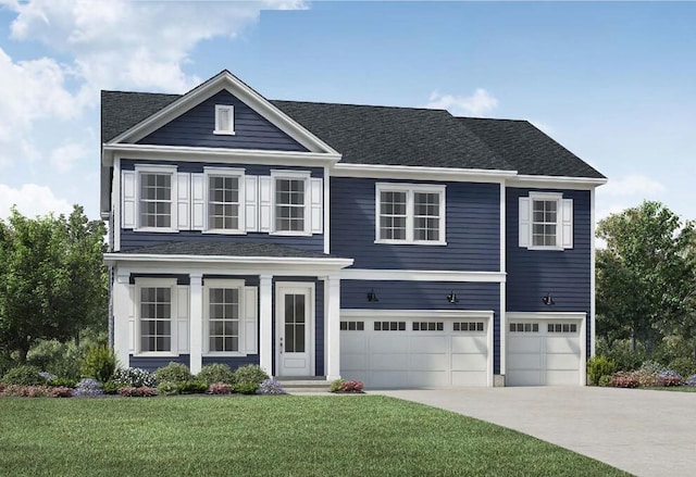 view of front of house with a garage and a front yard