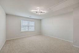 empty room with carpet flooring