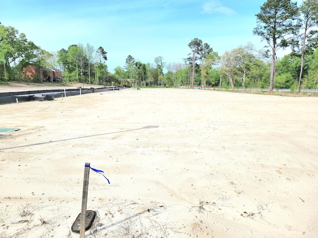 view of home's community featuring an enclosed area