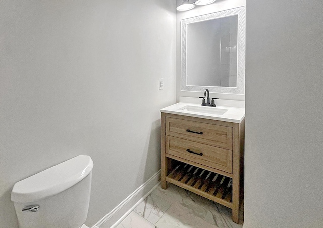 222 New Iris Ln, Ridgeville, SC 29472 - half bathroom featuring toilet, vanity, marble finish floor, and baseboards