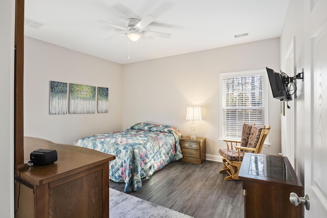 bedroom featuring dark wood-type flooring and ceiling fan