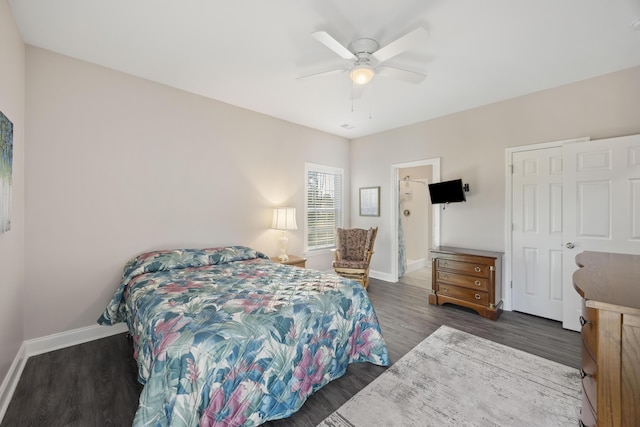 bedroom with ceiling fan, dark hardwood / wood-style flooring, a closet, and ensuite bath