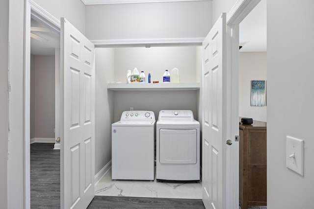 washroom featuring washing machine and dryer