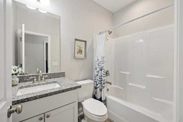 full bathroom with toilet, vanity, and shower / bath combo