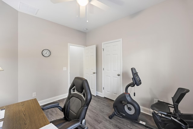 office area featuring dark wood-type flooring and ceiling fan