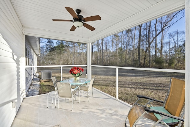 sunroom with ceiling fan and a wealth of natural light