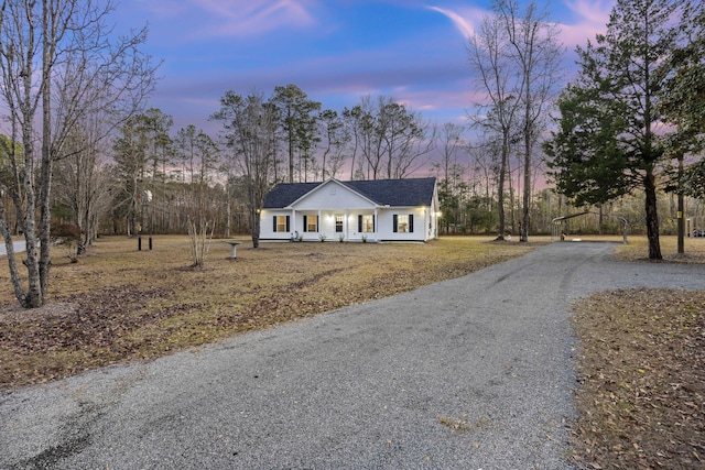 view of front of property featuring covered porch