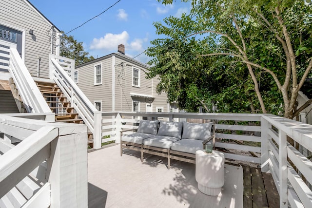 view of patio / terrace with a wooden deck and an outdoor hangout area