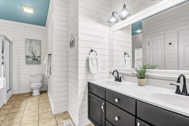 full bathroom with an enclosed shower, visible vents, tile patterned flooring, and a sink