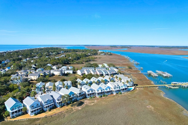 birds eye view of property with a residential view and a water view