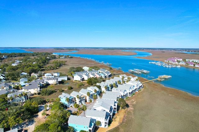 bird's eye view featuring a residential view and a water view