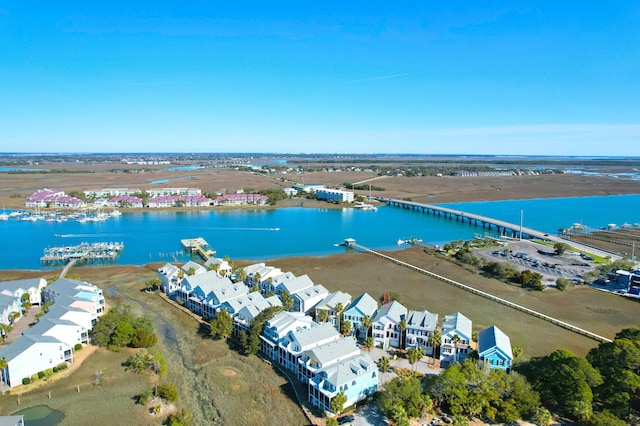 bird's eye view featuring a water view and a residential view