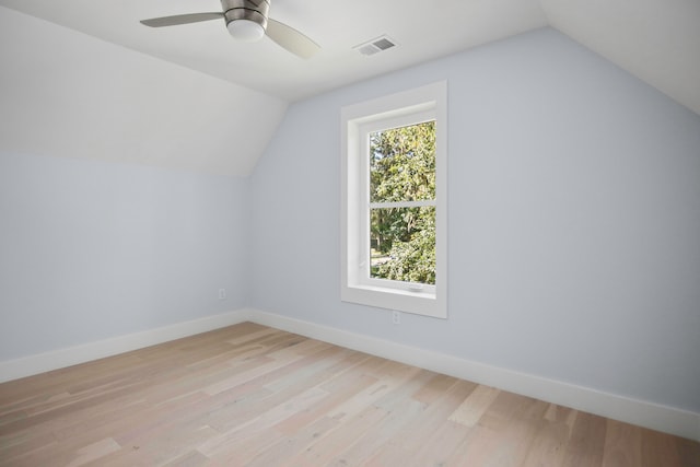 bonus room with light hardwood / wood-style flooring, lofted ceiling, and ceiling fan